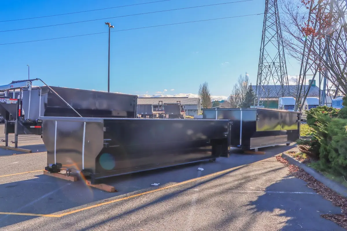 Roll-off dumpster ready for waste disposal at job site for Demolition Dumpster Rental in Lewiston